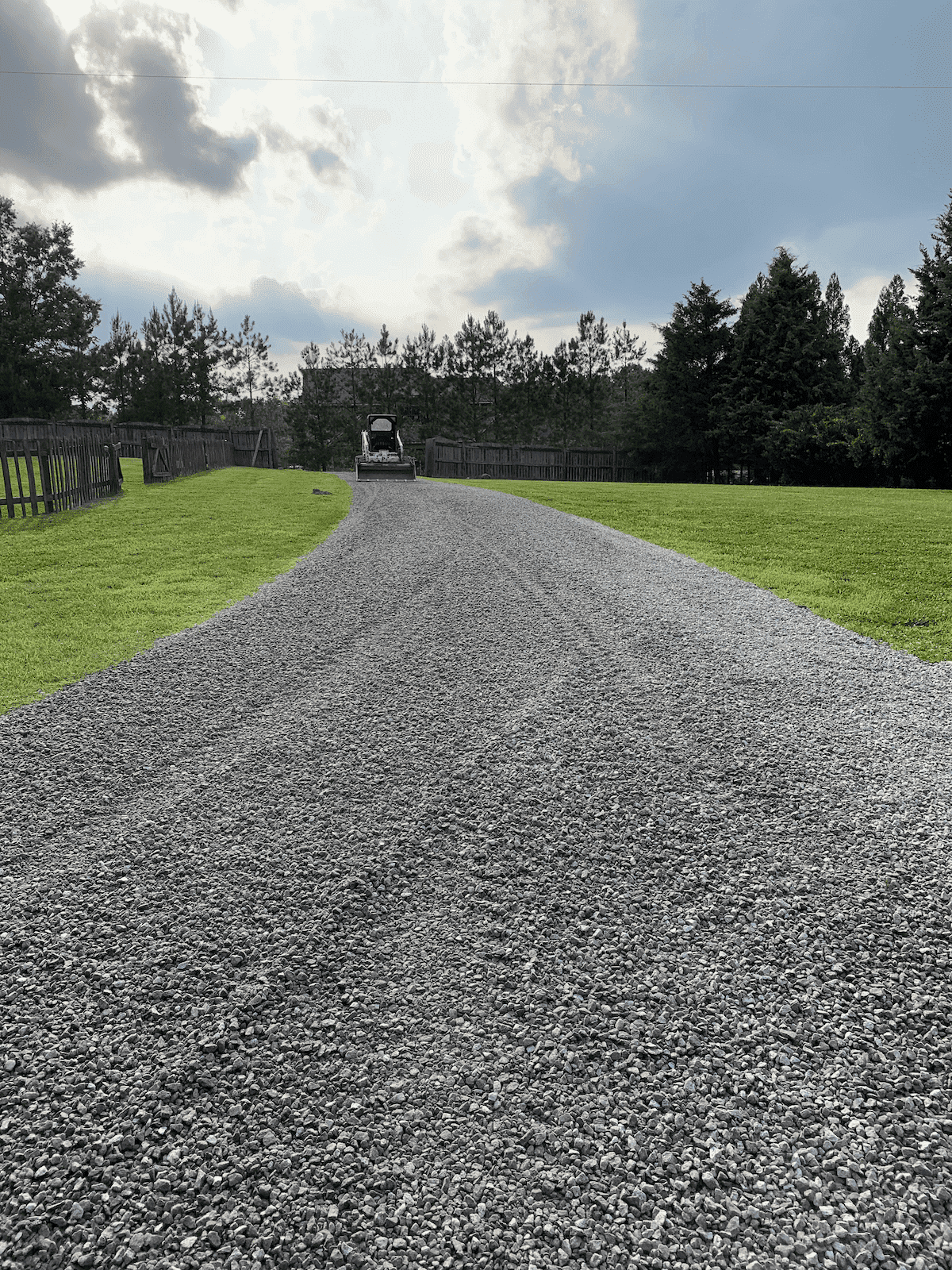 Graded gravel driveway with clean edges